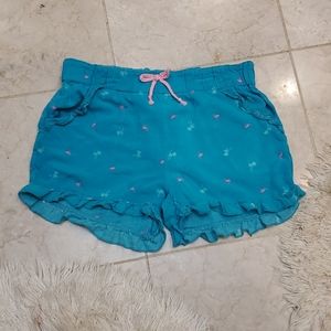 Blue shorts with flamingos